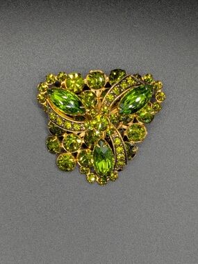 Vintage Austrian green rhinestone brooch